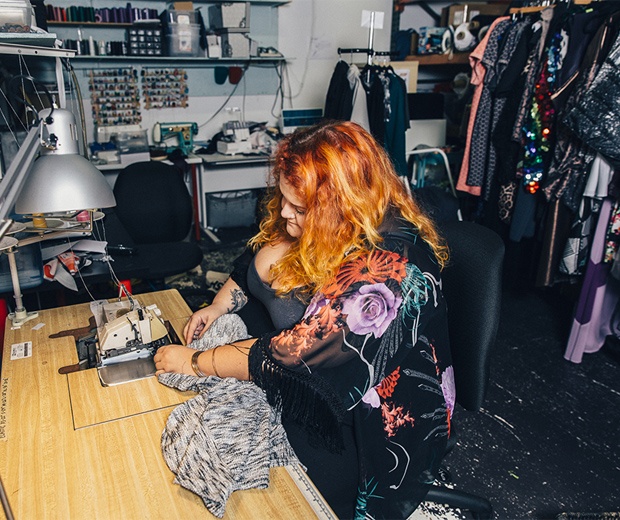 Claire Doody works on a garment for her plus-size fashion label, Copper Union.