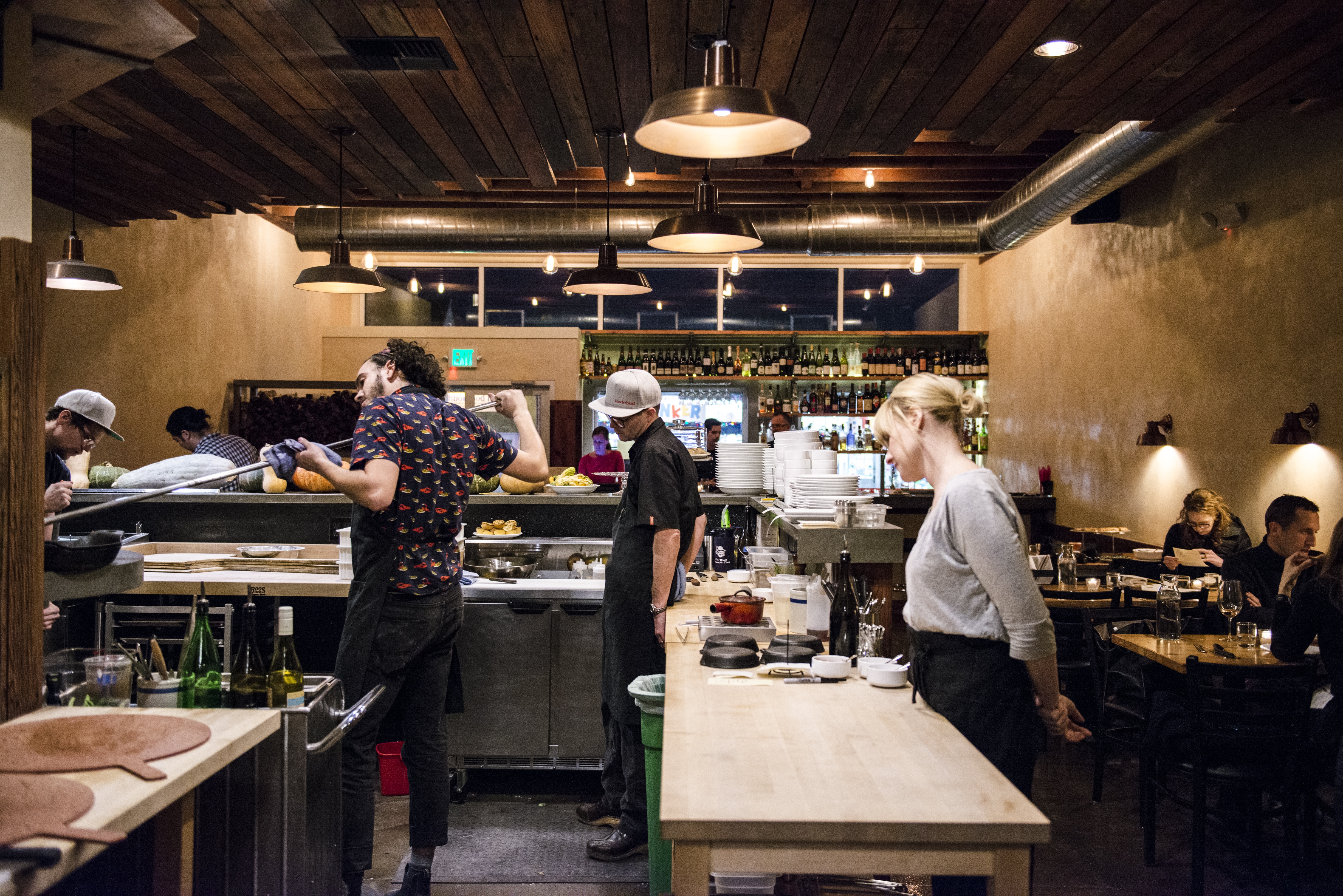Wood-fired seasonal pizzas being prepared at Tastebud.