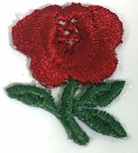 Photo of an embroidered red rose lapel sticker