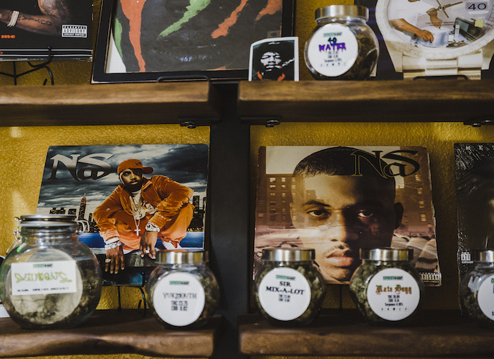Hip-hop records and jars of rapper-themed cannabis decorate Green Hop Dispensary.