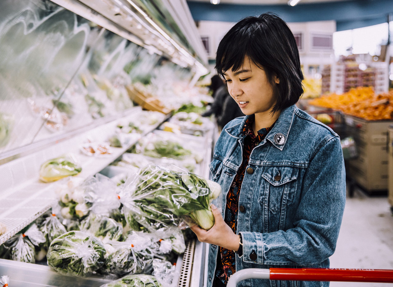 Tran shops for produce at Asian grocery store Hong Phat.