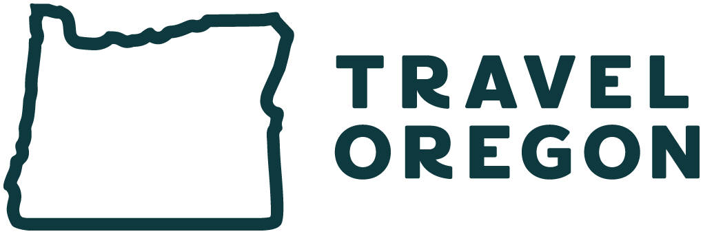logo with outline of Oregon and the text Travel Oregon