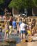 Kids play in the fountain at Jamison Square in the Pearl District.